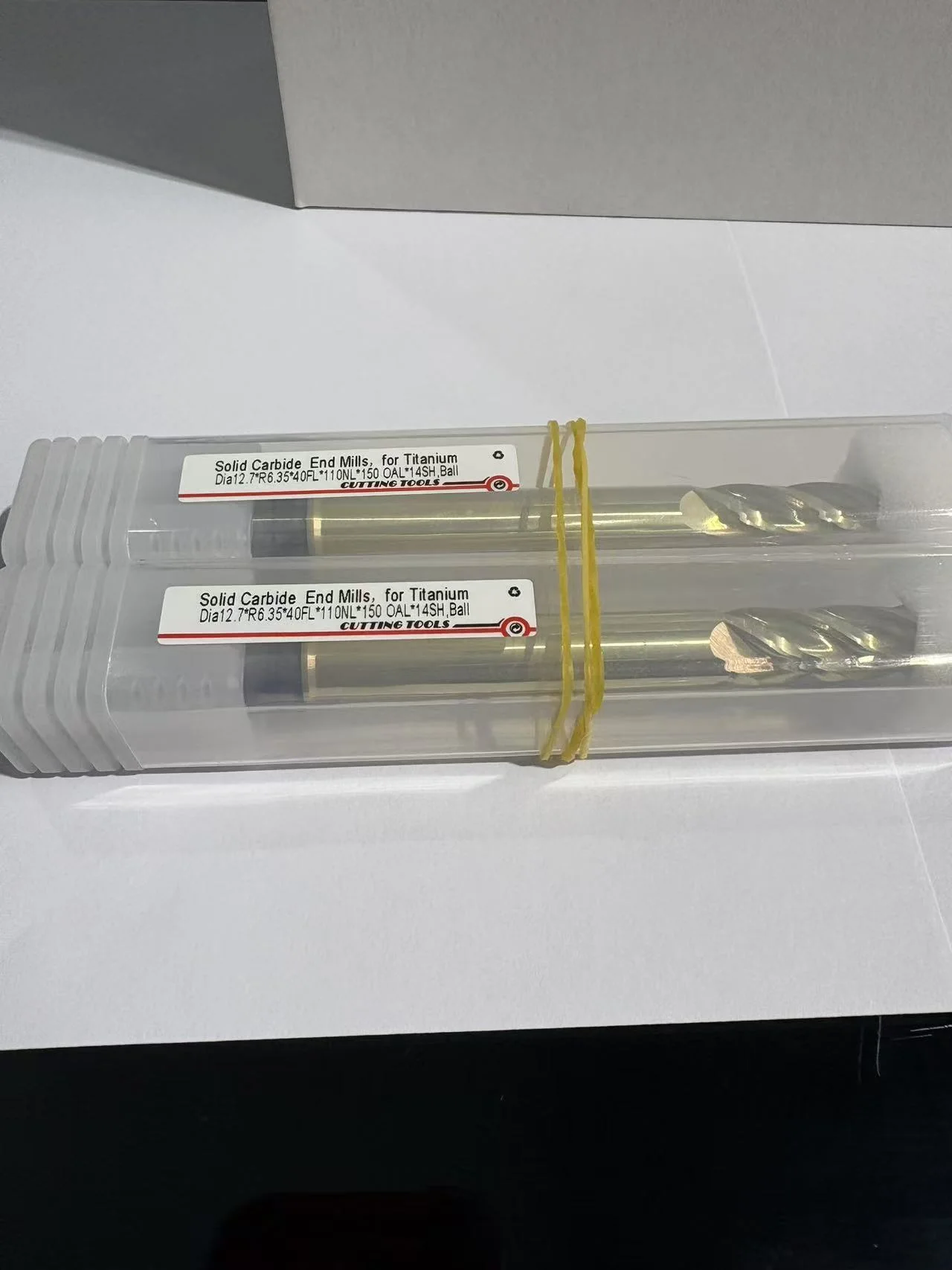 Packaged 12.7 mm ZrN ball nose carbide end mill samples for titanium