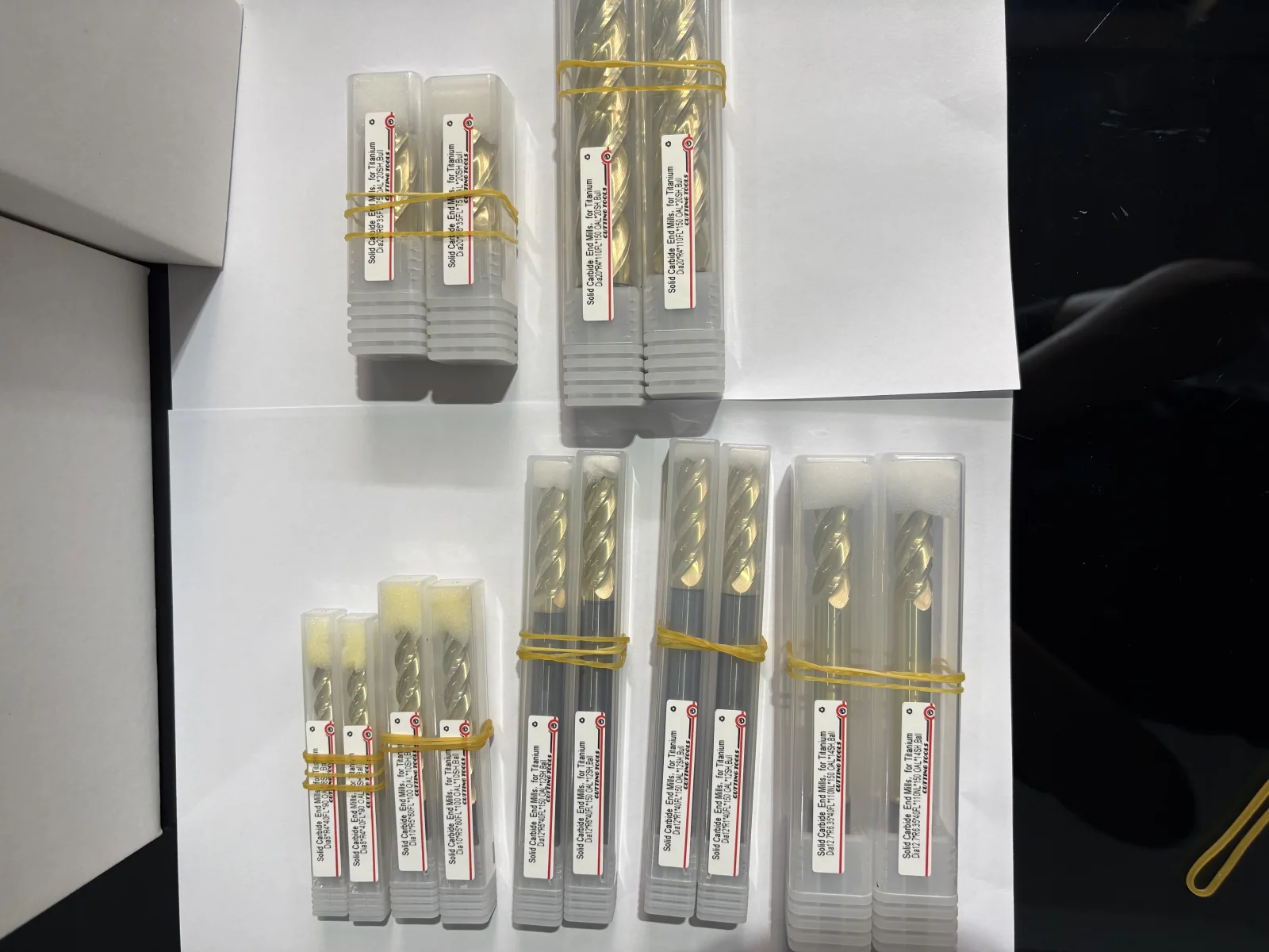 Champagne-gold ZrN-coated carbide end mills from an existing production batch